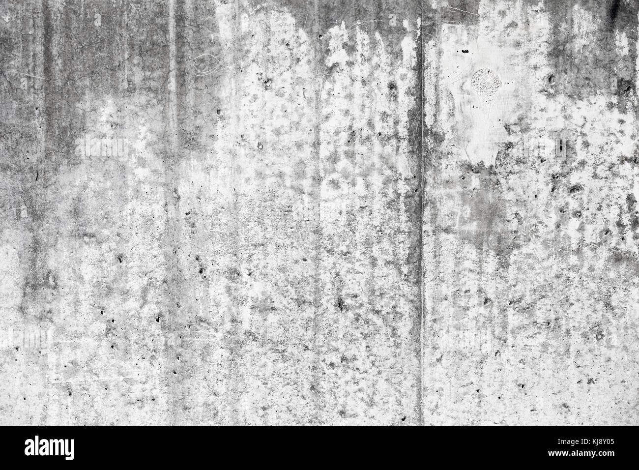 Vecchio grungy parete in calcestruzzo con macchie di umido, frontale foto di sfondo texture Foto Stock