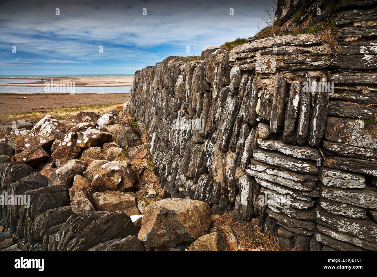 Il vecchio muro di mare pietra grezza opera Foto Stock