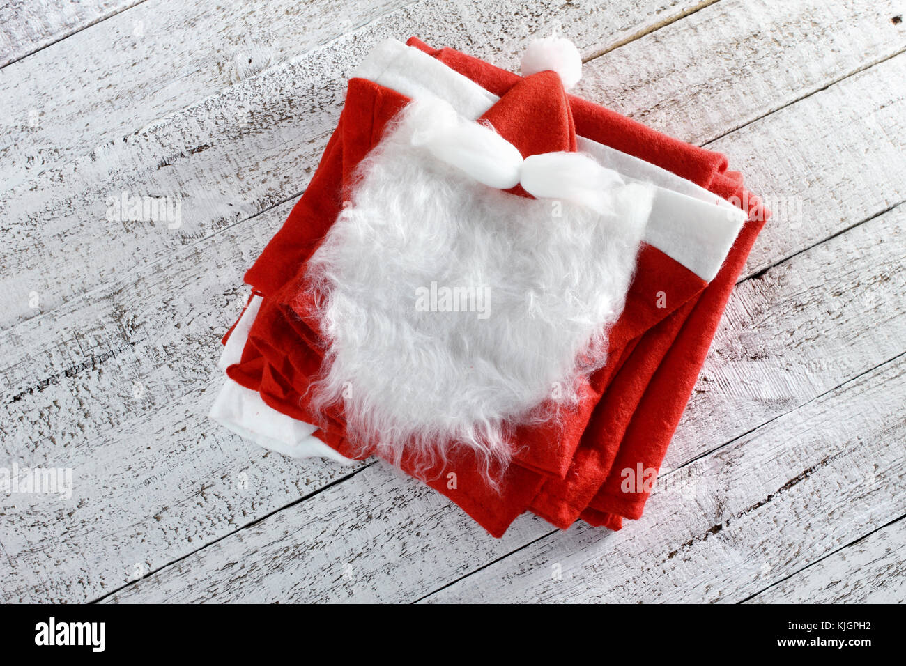 Santa Claus costume su sfondo di legno Foto Stock