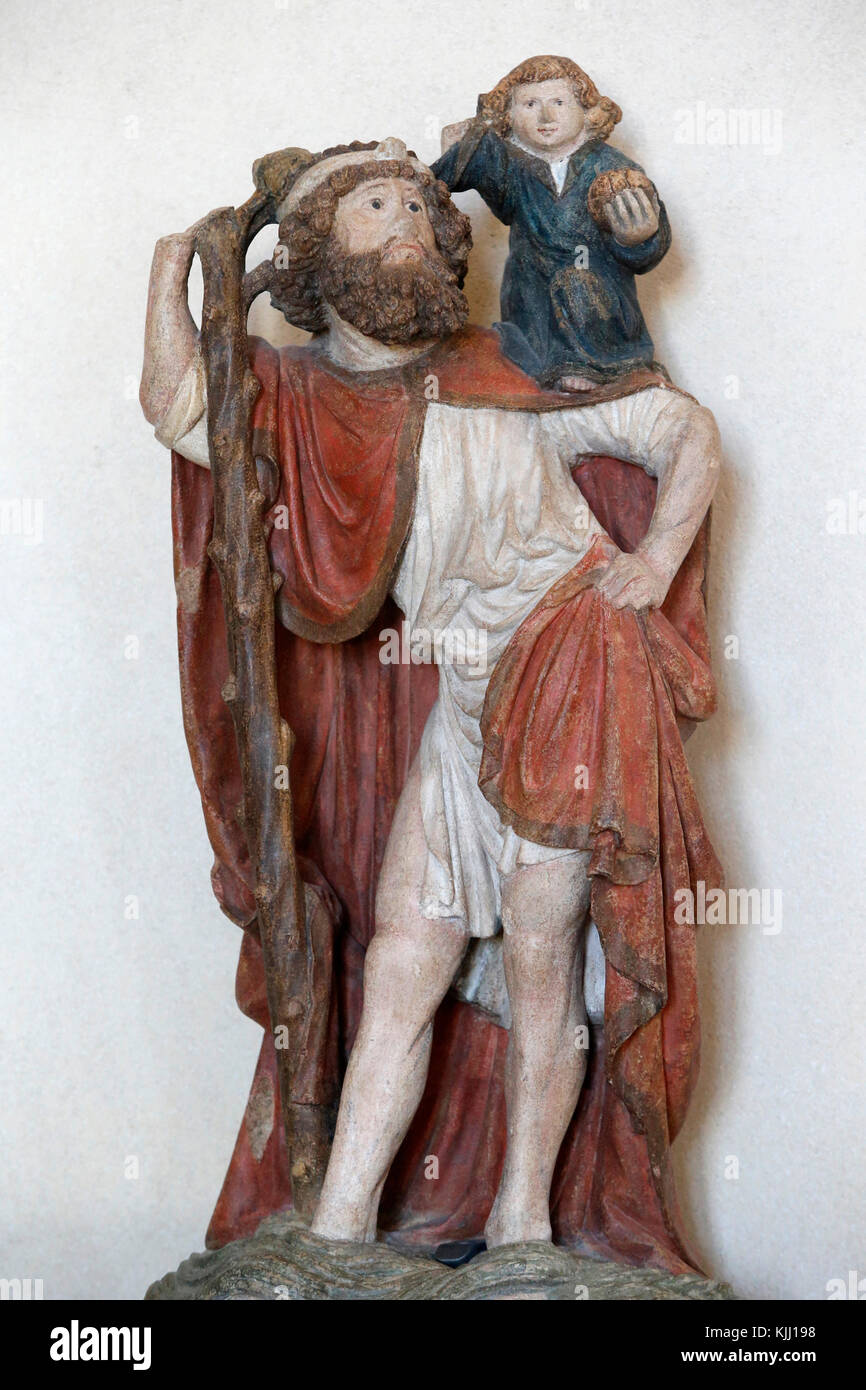 Il museo del Louvre. San Cristoforo. Pietre policrome. Eventualmente dalla Borgogna, XV secolo. La Francia. Foto Stock