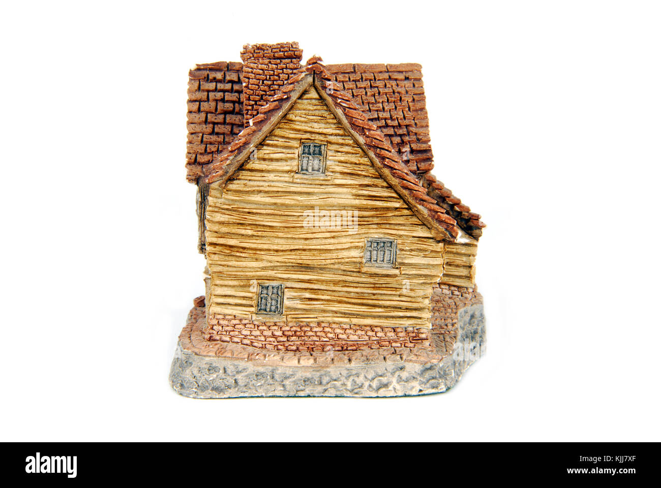 Casa in miniatura isolato su bianco Foto Stock
