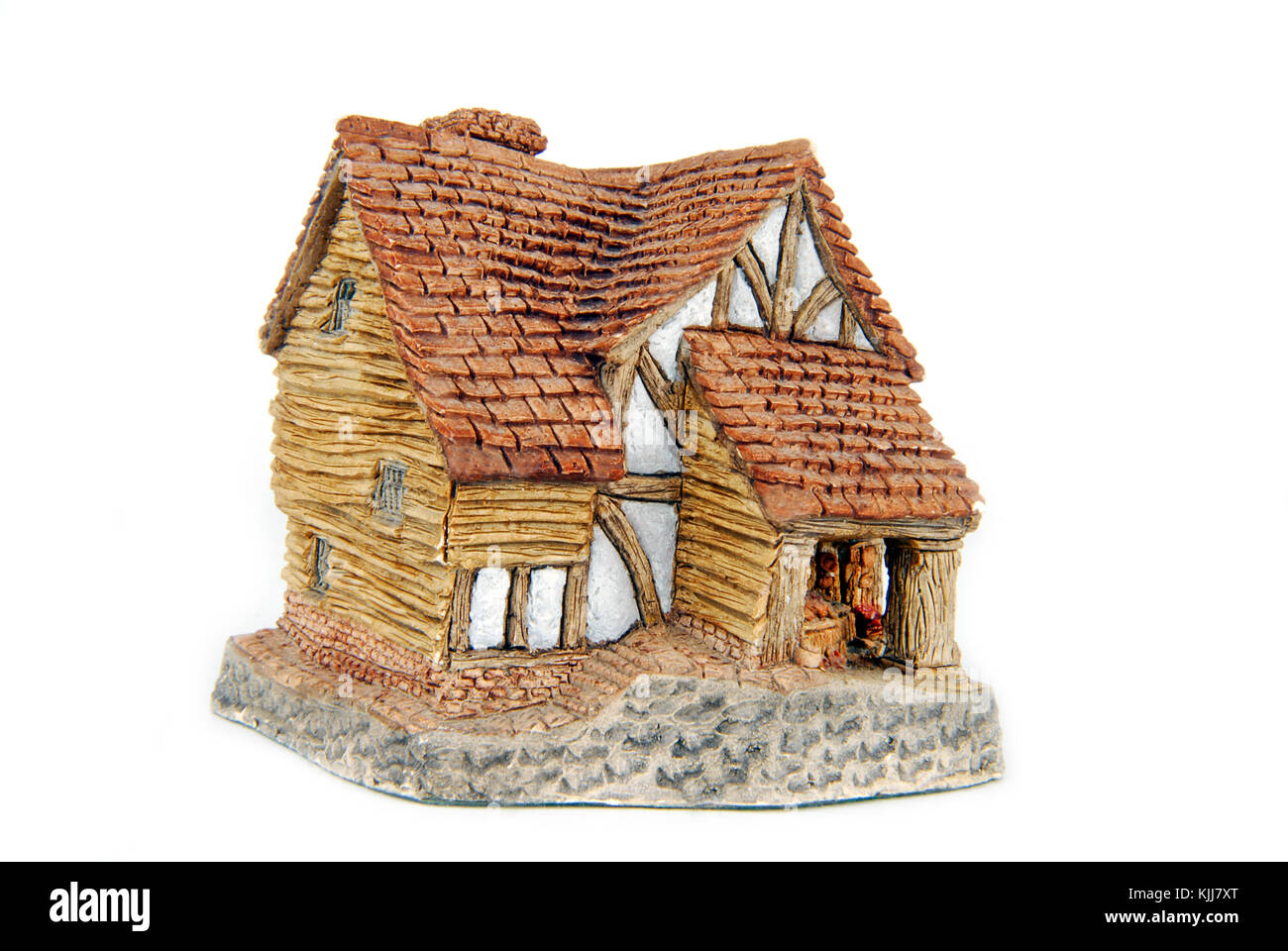 Casa in miniatura isolato su bianco Foto Stock