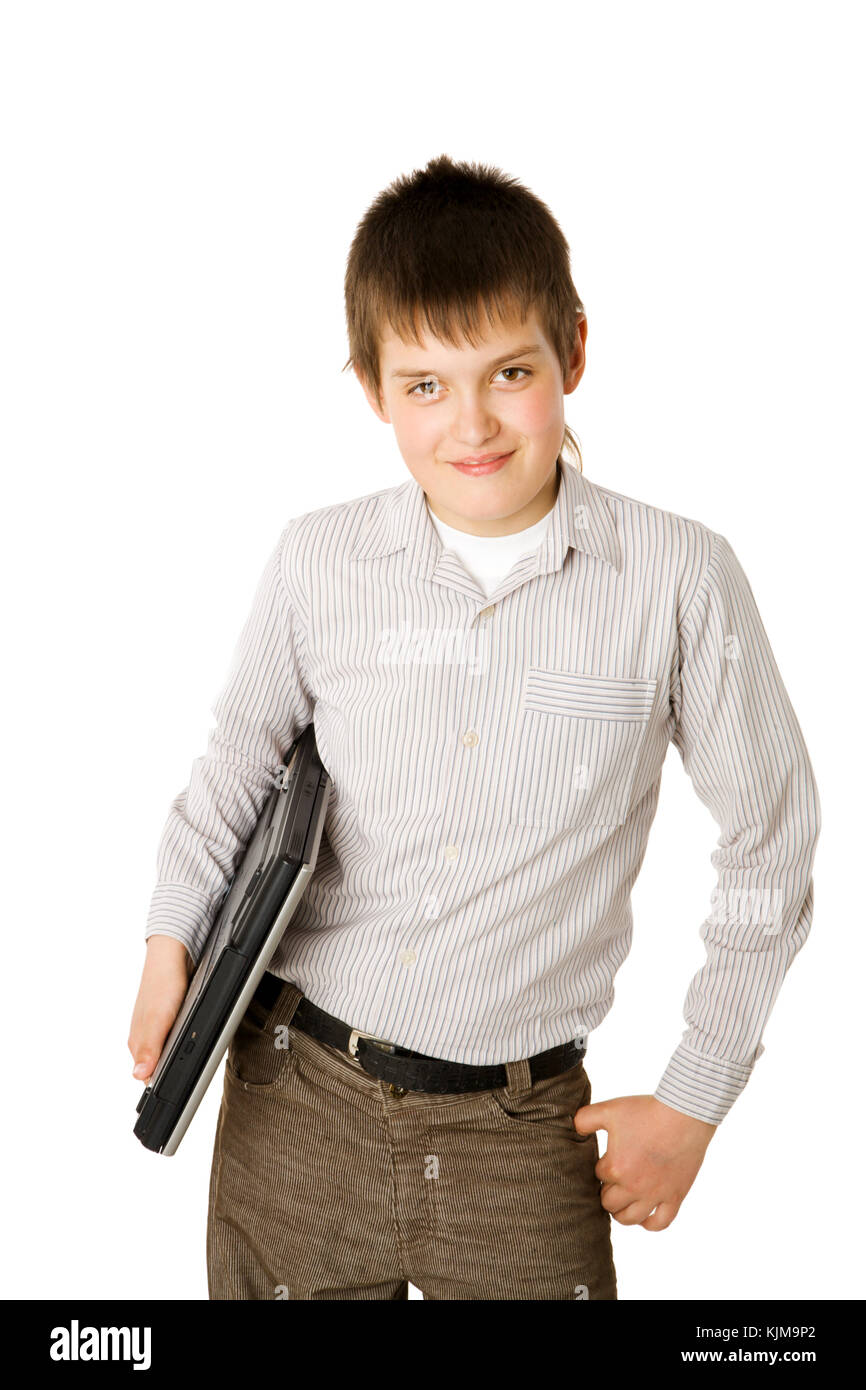 Dieci anni Boy holding laptop isolato su bianco Foto Stock