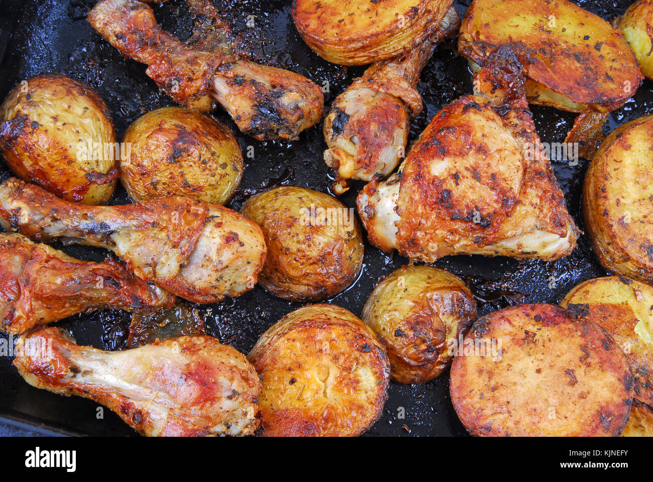 Pollo arrosto e patate Foto Stock