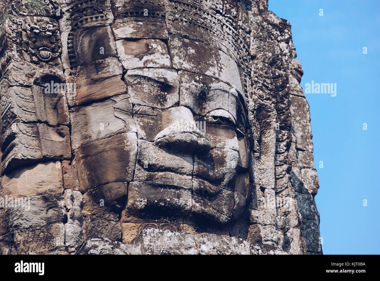 Una delle facce gigante a Angkor Thom, Cambogia. Foto Stock