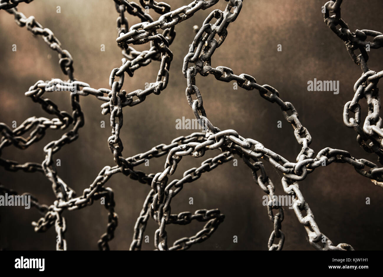 Abstract della catena di ferro link su sfondo di rame Foto Stock