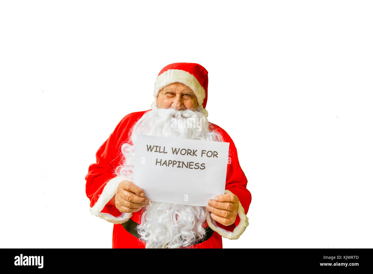 Babbo Natale mostra cartello con frase lavorerà per la felicità isolata su sfondo bianco Foto Stock