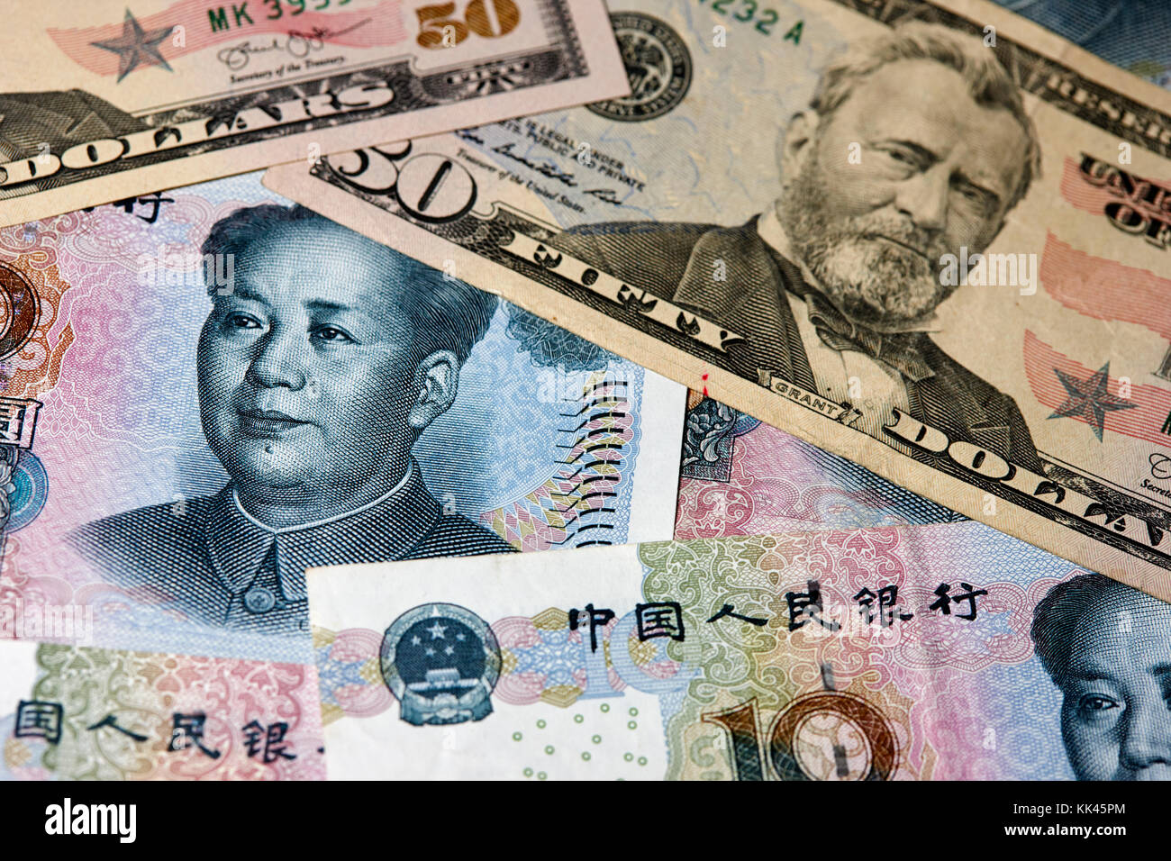 Yuan Renminbi e US dollar banconote Foto Stock
