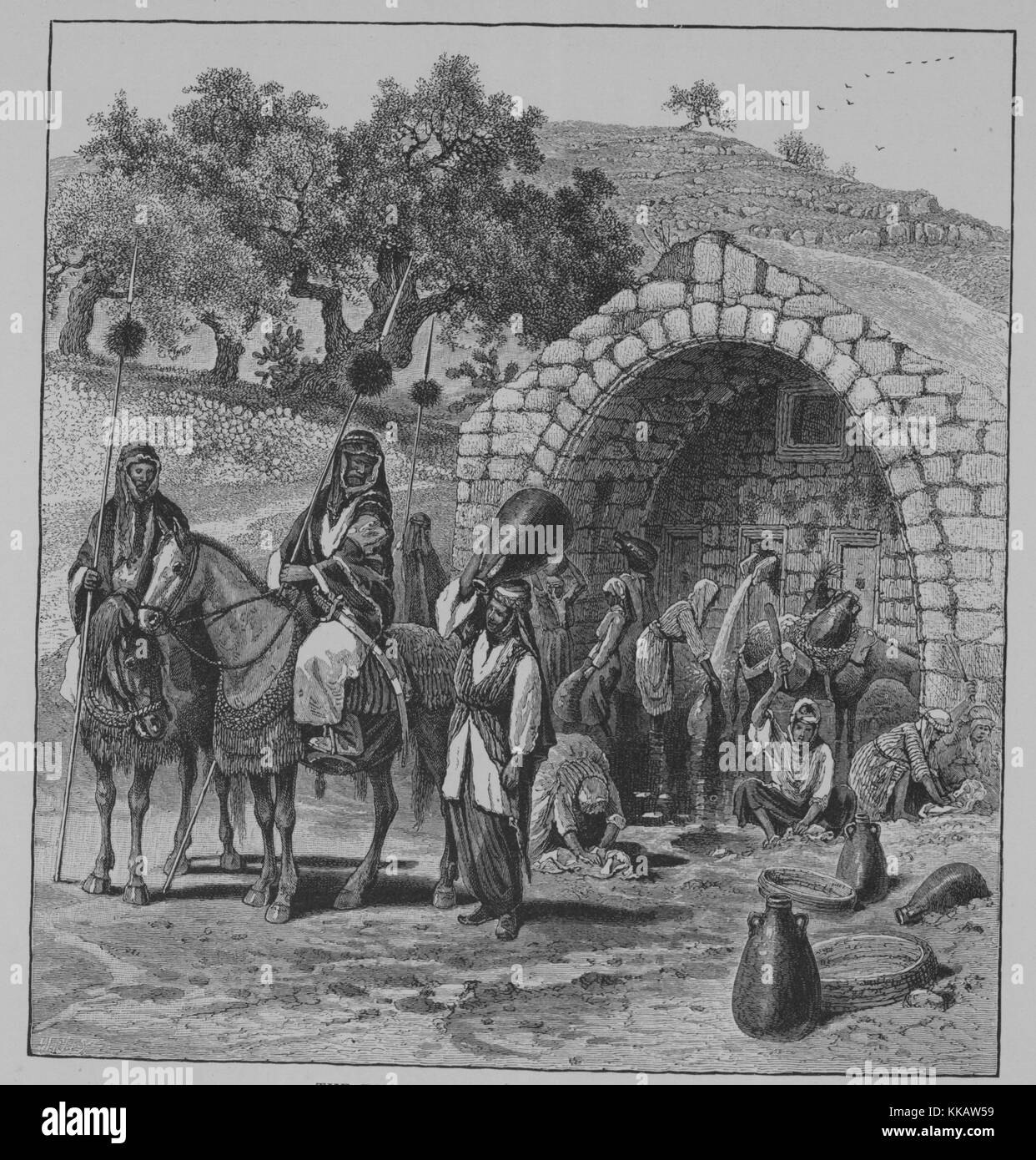 Incisione su legno raffigurante un gruppo di uomini e donne, alcuni uomini a cavallo, alcune donne lavaggio, di fronte a una struttura in pietra, con la dizione "La Fontana della Vergine di Nazaret, sul lato orientale della città, un beduino sheikh con la sua assistente in primo piano portante lunghe lance tufted, donne acqua di riempimento-giare e pulizia delle loro vesti per immersione e li batte con forte pipistrelli in legno", dal libro pittoresco Palestina, Sinai, Egitto, da Sir Charles William Wilson, 1882. Dalla Biblioteca Pubblica di New York. Foto Stock