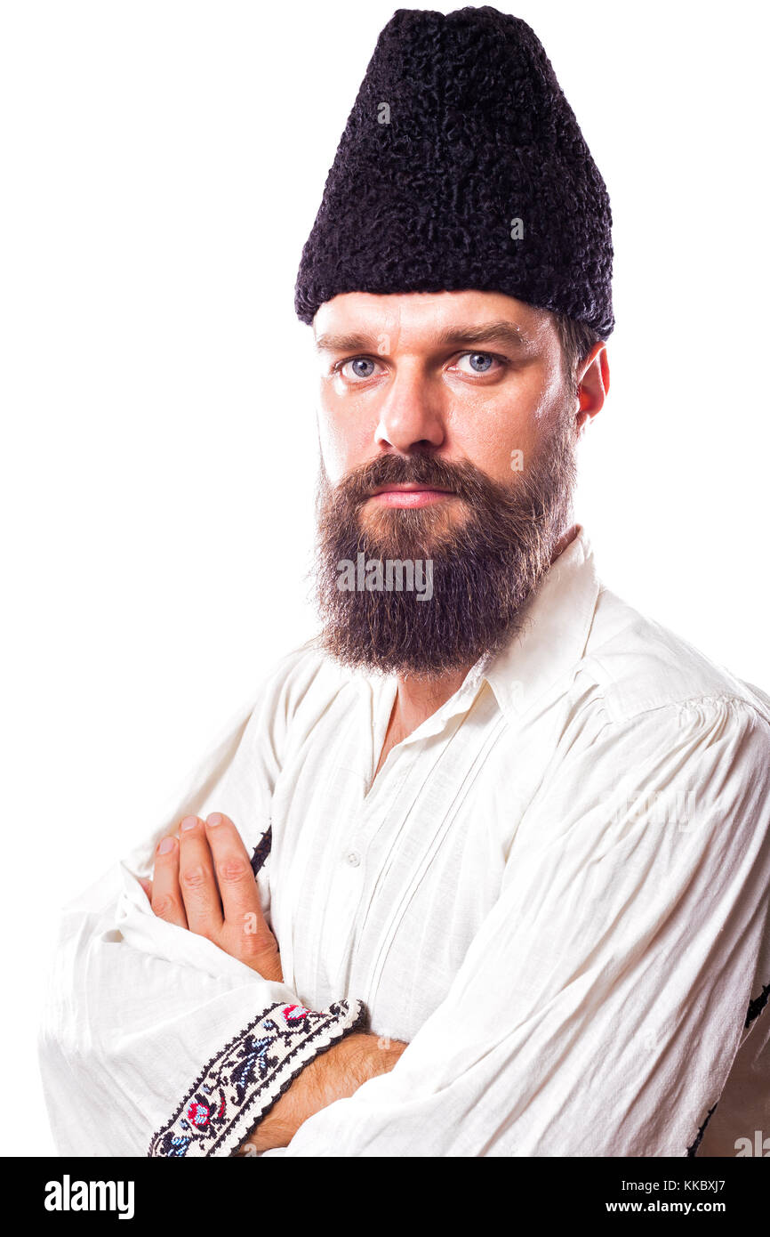 Giovane uomo indossando il tradizionale costume rumeno wintage immagine Foto Stock