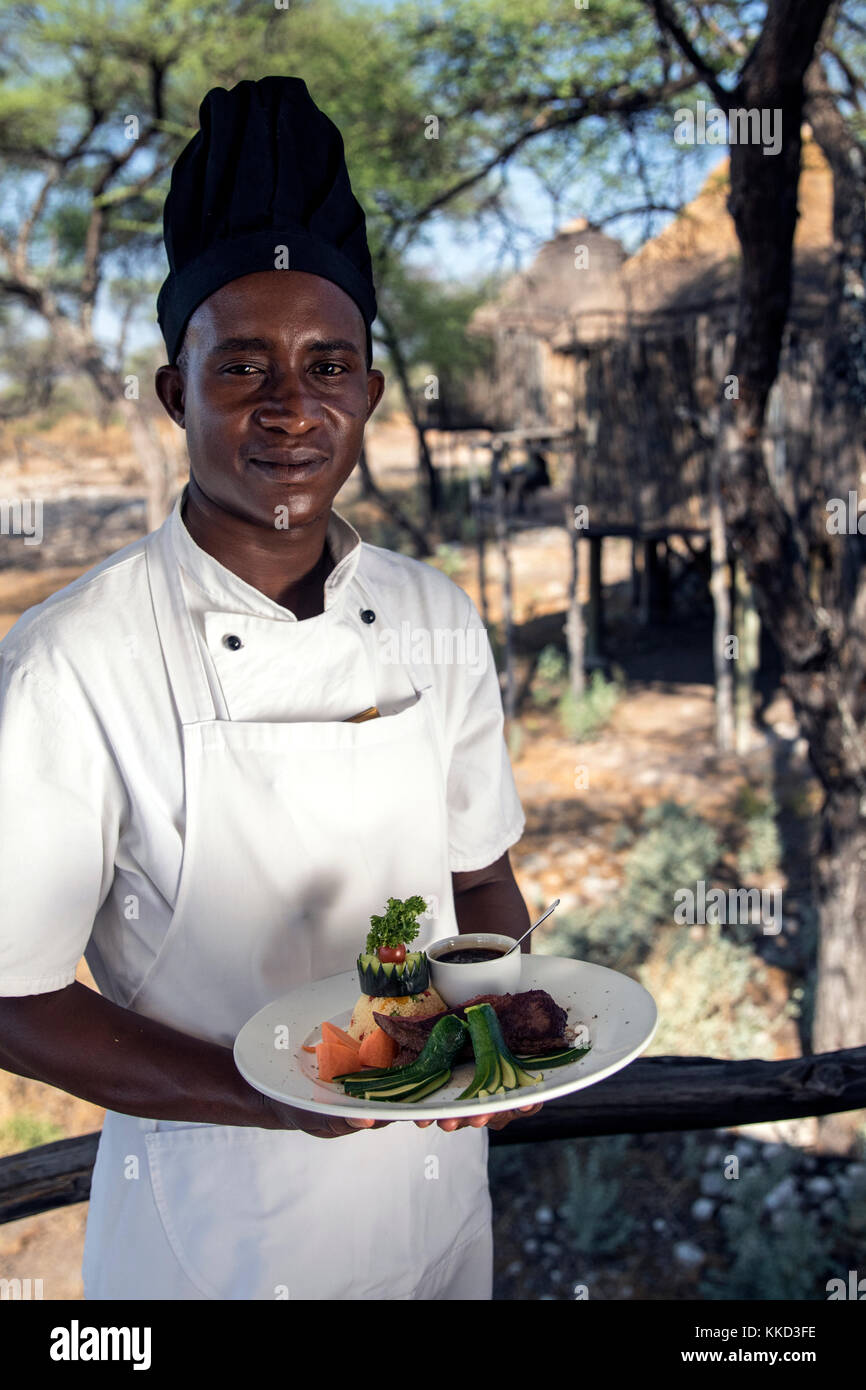 Chef onguma tree top camp, onguma Game Reserve, Namibia, Africa Foto Stock