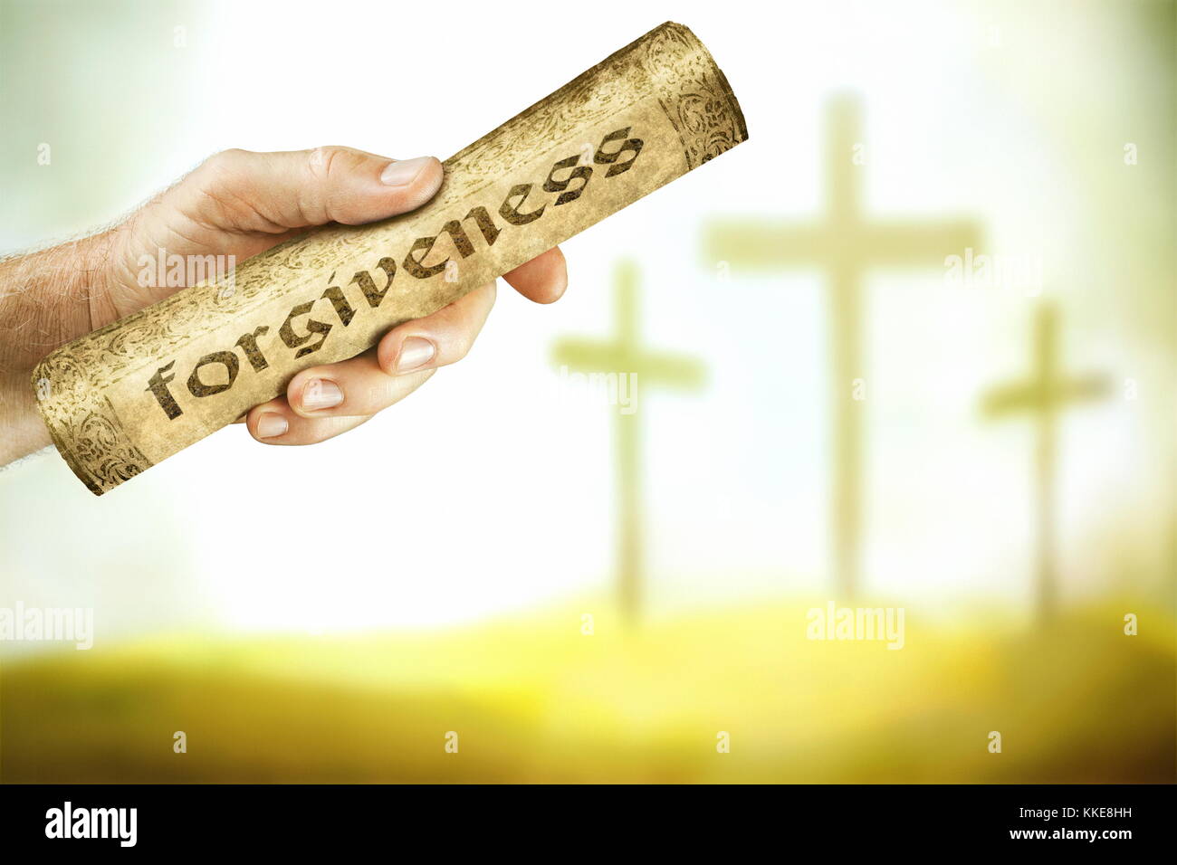 Una mano che mostra il messaggio di perdono dalla croce del Signore Gesù. Gesù sangue grida con un messaggio di perdono e di riconciliazione. Foto Stock
