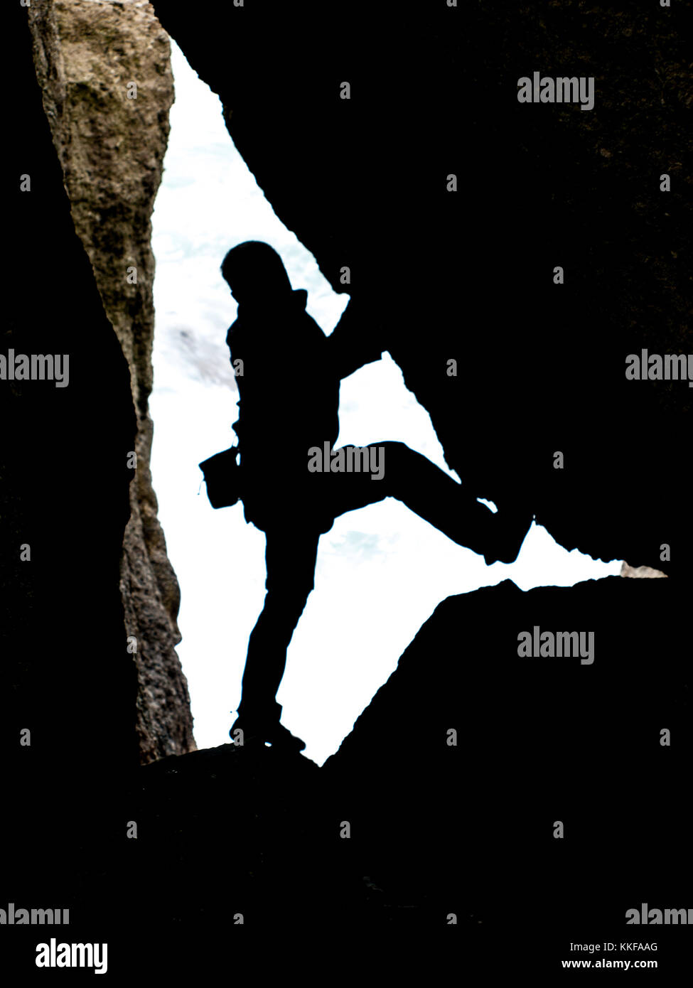 L'uomo arrampicata Foto Stock