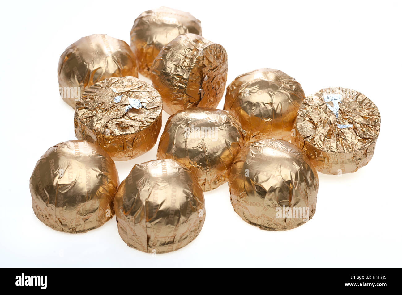 Oro stagnola avvolto delle suonerie cioccolato al latte Mallows Foto Stock