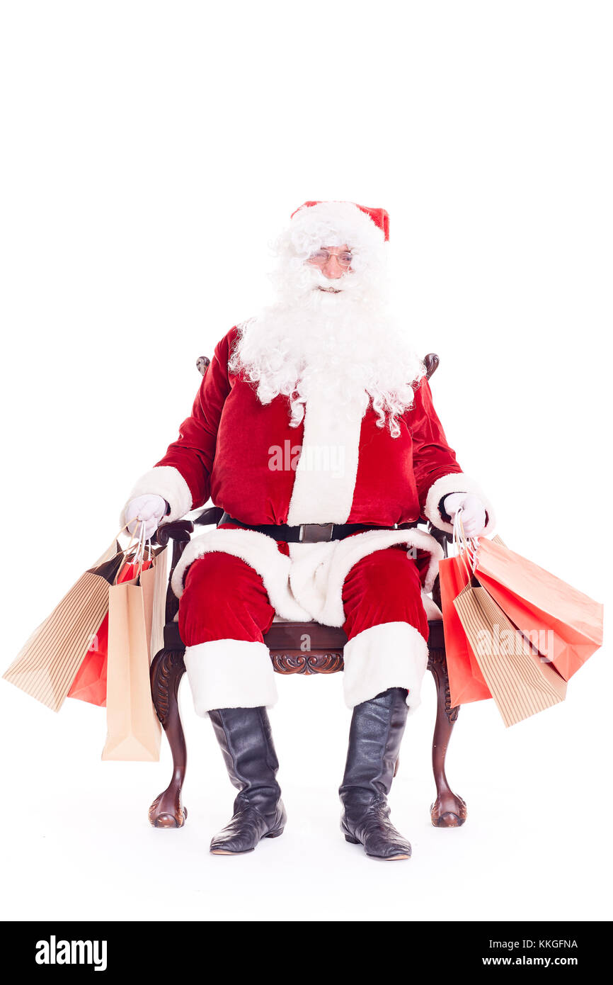 Santa dopo lo shopping natalizio Foto Stock