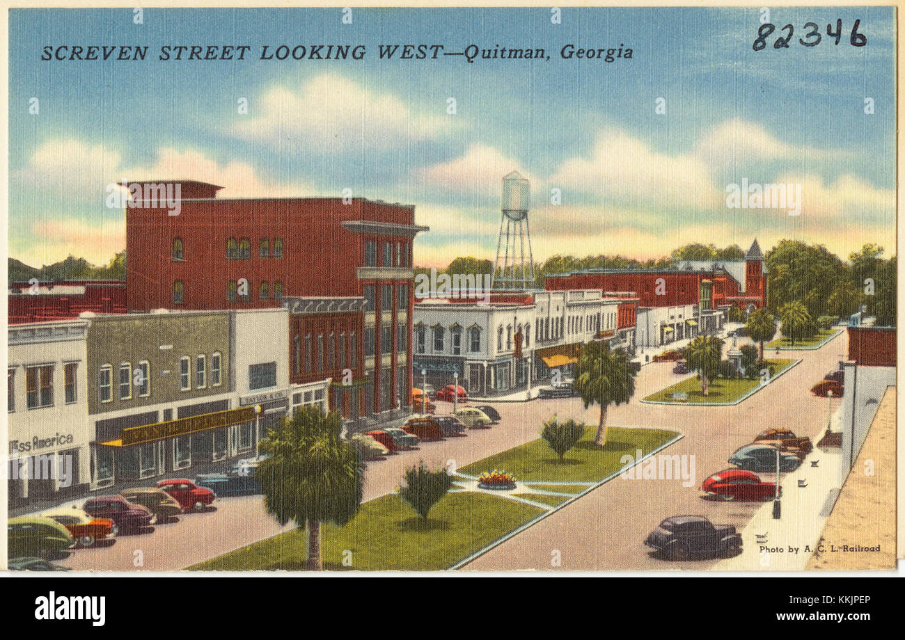 Questa immagine cattura una vista verso ovest di Screven Street a Quitman, Georgia, probabilmente mostrando il paesaggio stradale locale, l'architettura e l'ambiente della zona. Foto Stock