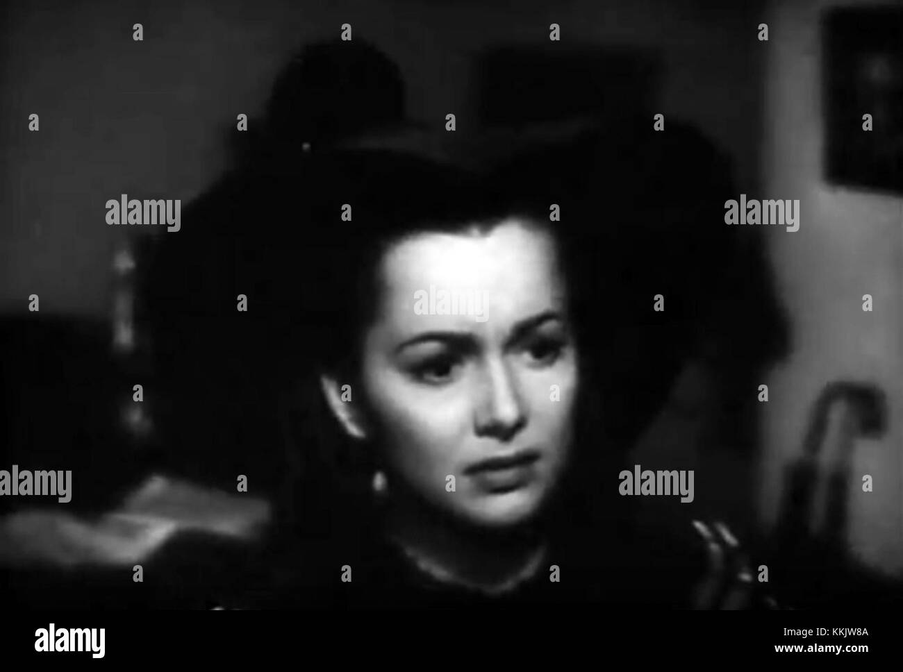 Olivia de Havilland, una rinomata attrice, è presente nel trailer di "devozione", che mostra la sua performance in questo significativo film. Nota per i suoi ruoli nella classica Hollywood, la performance di de Havilland in questo film segna un momento significativo nella sua carriera di attrice. Foto Stock