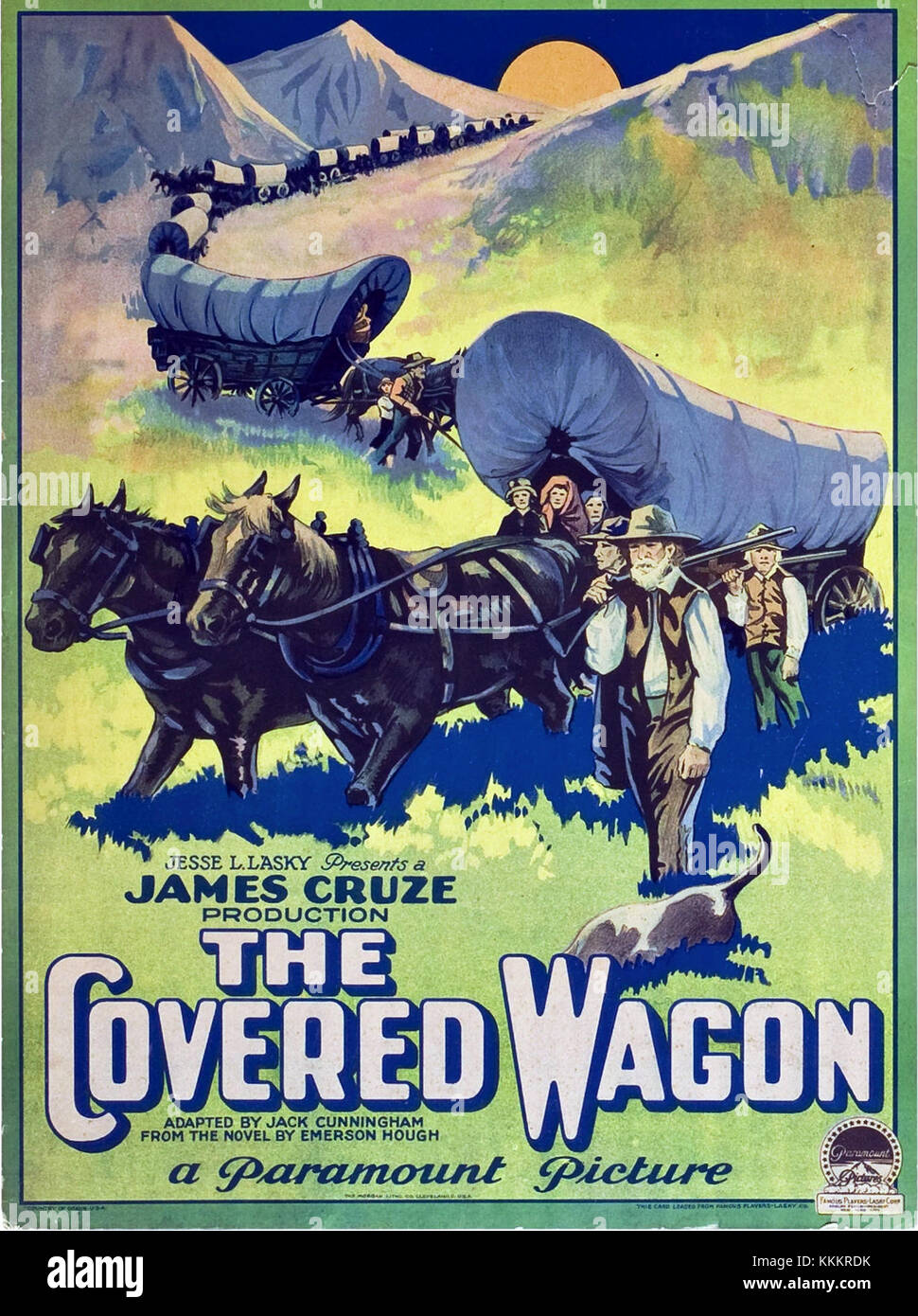 Il poster del carro coperto è un pezzo pubblicitario vintage degli anni '1920, che promuove l'iconico film WESTERN, il carro coperto, che mette in evidenza i temi pionieristici e il significato cinematografico del film. Foto Stock