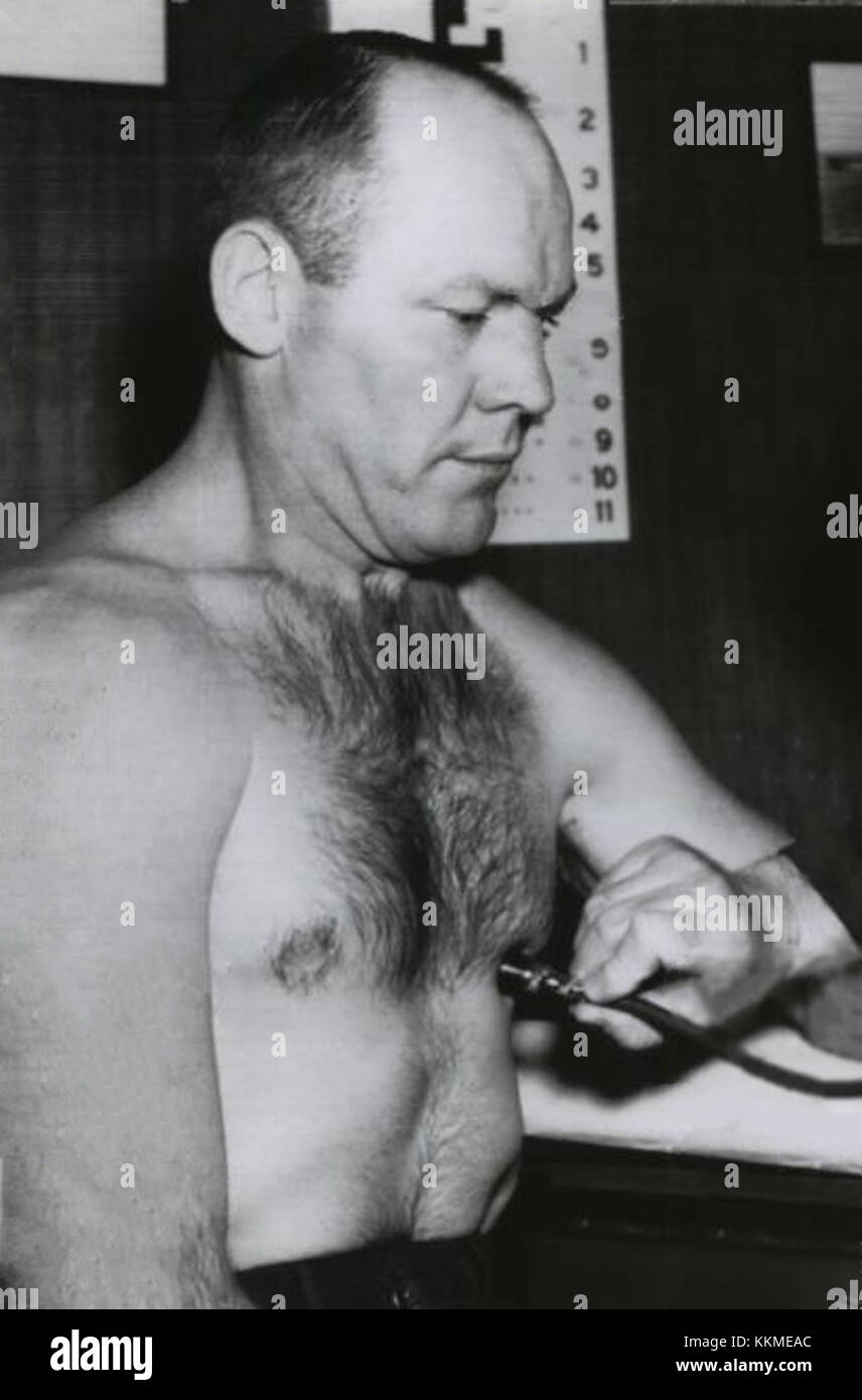 Pete Rademacher era un atleta noto per la sua carriera nel pugilato durante i primi anni '1960 Ha guadagnato attenzione per le sue partite e contributi allo sport della boxe, mostrando forza e perseveranza sul ring. Foto Stock