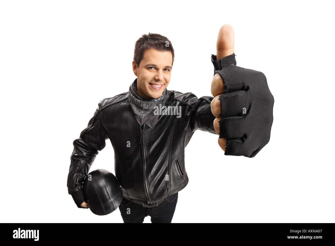 Biker con un casco rendendo un pollice in alto segno isolato su sfondo bianco Foto Stock