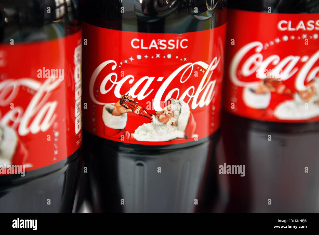 La coca-cola natale etichetta bottiglie Foto Stock