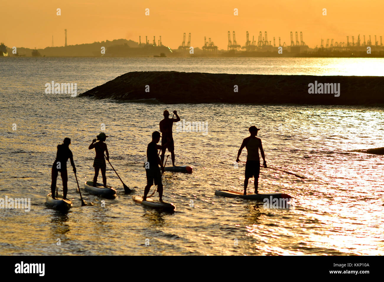 Stand Up Paddle surf e stand up paddle boarding (SUP) Foto Stock