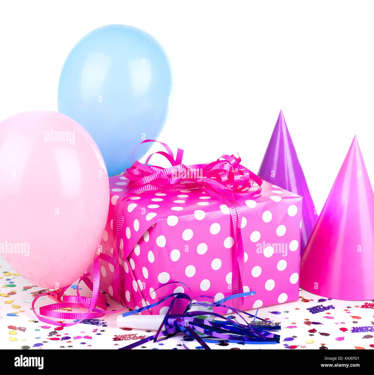 Rosa con il bianco polka dot regalo di compleanno e palloncini e cappelli di partito Foto Stock