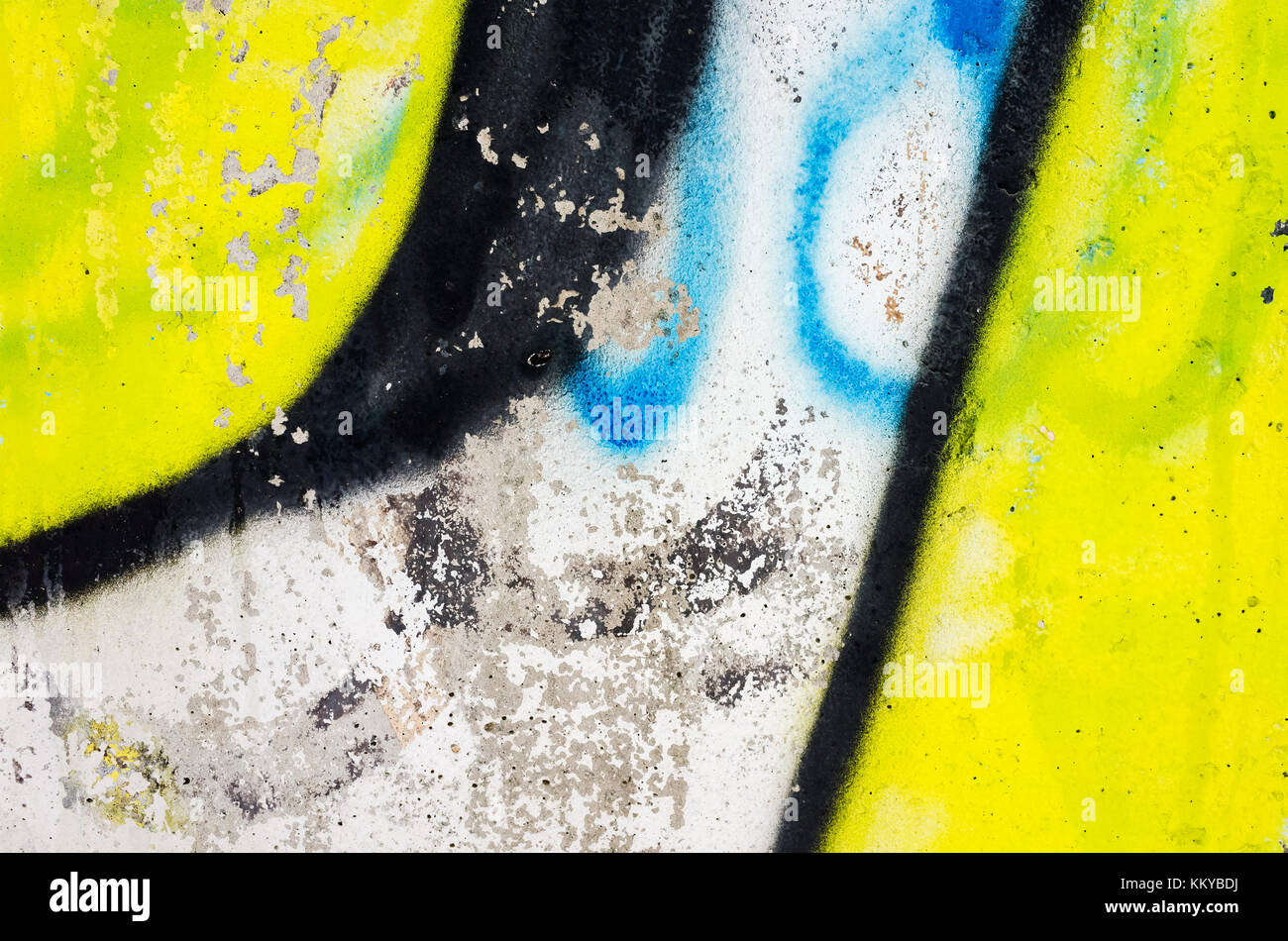 Abstract colorati frammento graffiti su un vecchio muro di cemento Foto Stock