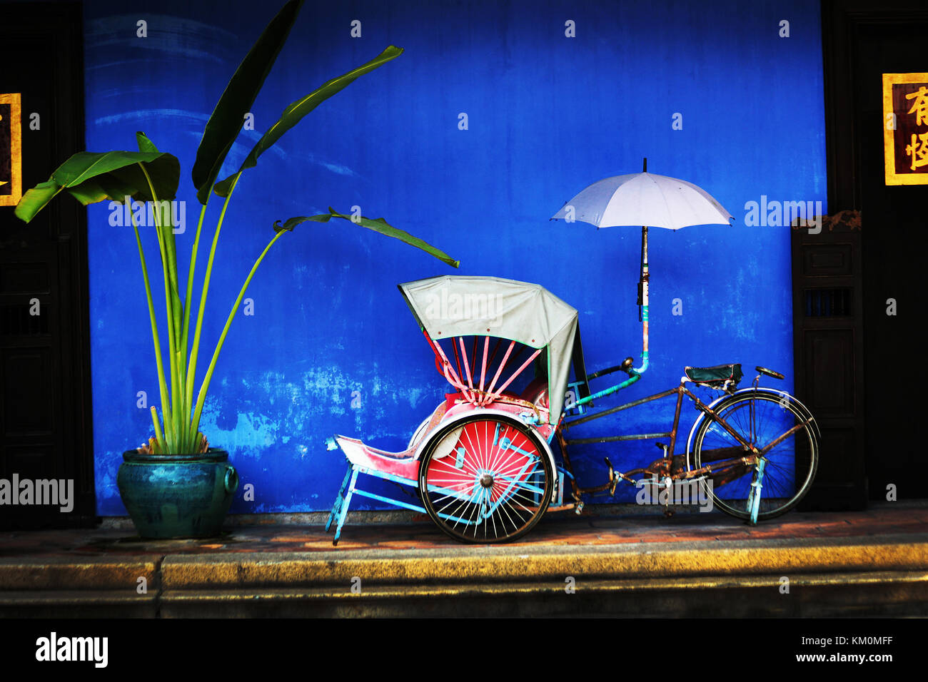 Penang Malaysia, scene di strada dell'Estremo Oriente e colori esotici tra cui Singapore e le strade di Singapore Foto Stock