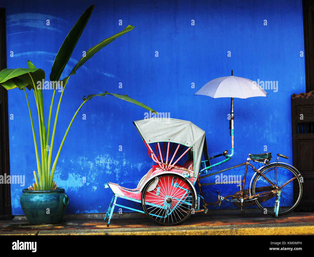 Penang Malaysia, scene di strada dell'Estremo Oriente e colori esotici tra cui Singapore e le strade di Singapore Foto Stock