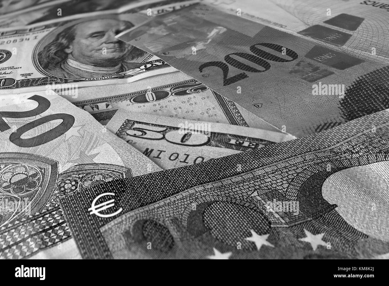 Abstract dollar euro Swiss franc sfondo bianco e nero Foto Stock