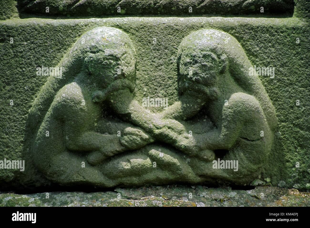 Pannello di albero di dettaglio della Croce alti anche chiamato Muiredach's Cross a Monasterboice, nella contea di Louth. Celtic motif barba estrattori. Foto Stock