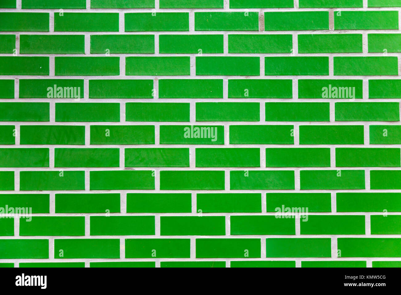 Green Sfondo mattone Foto Stock