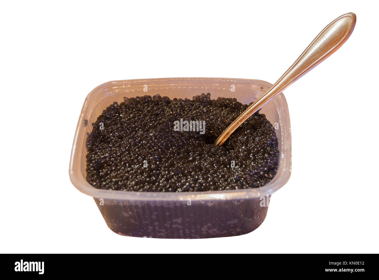 Pesce nero caviale in un vaso, un cucchiaio di metallo. Il russo di delicatezza. Foto Stock