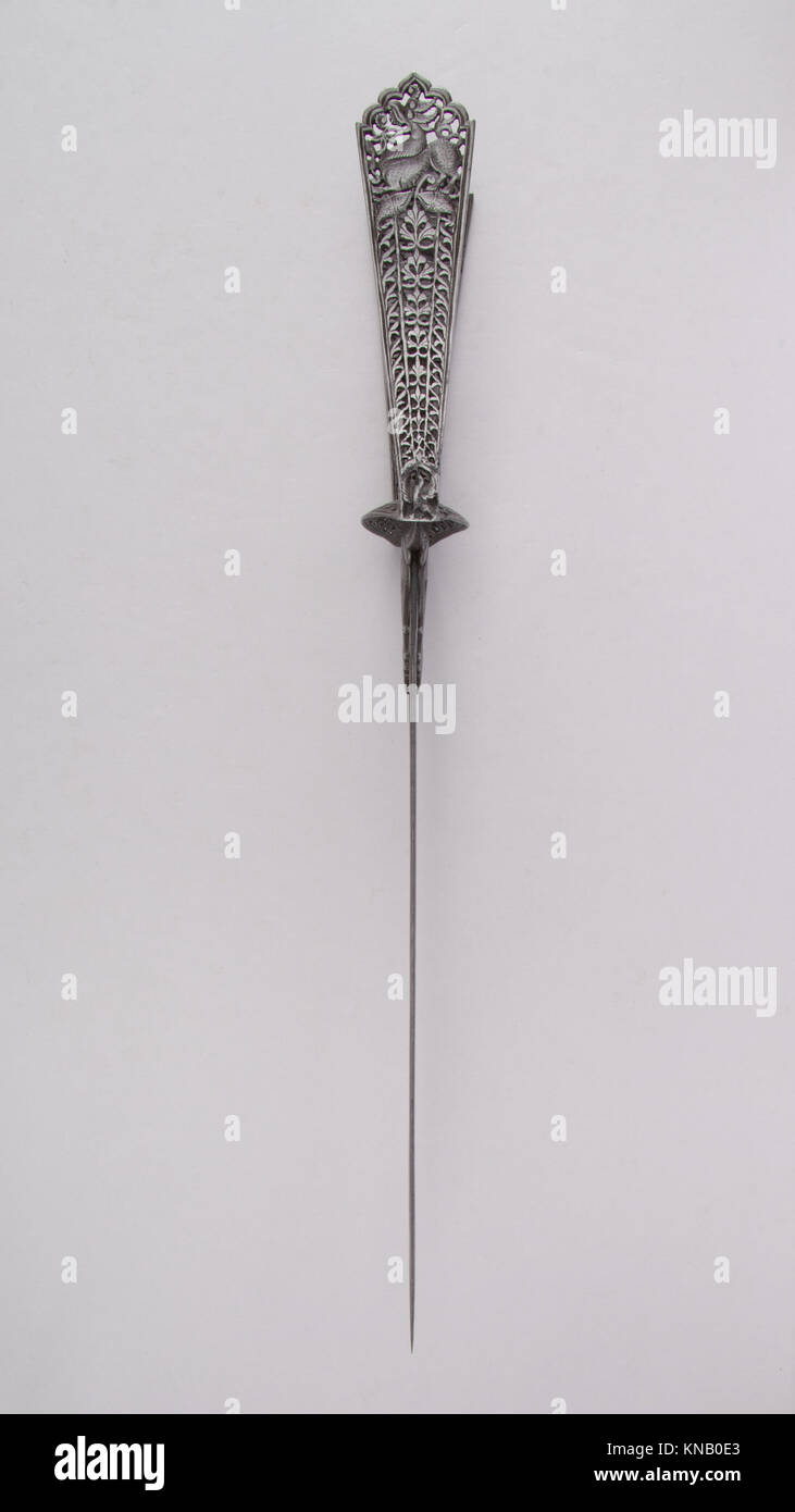 Pugnale indiano Katar con aletta e lama uniche, che esemplificano l'artigianato e il design tradizionali delle armi del Sud Asiatico. Foto Stock