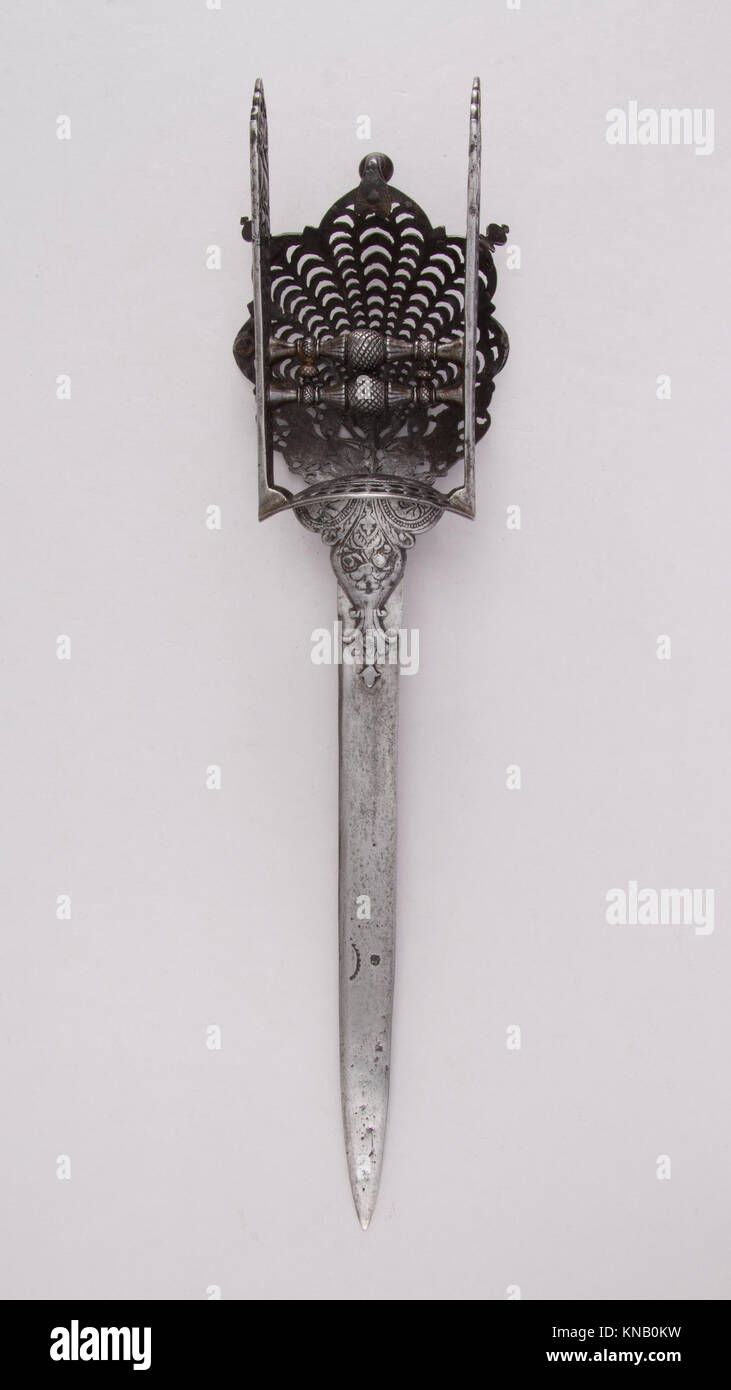 Questo pugnale Katar catalogato MET, 36.25.1010, rappresenta le armi storiche indiane e l'artigianato tradizionale del periodo. Foto Stock