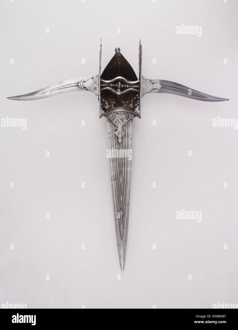 Questo pugnale katar ha due lame laterali (Bichuwa), che esemplificano le tradizionali armi indiane e l'uso in combattimenti storici. Foto Stock