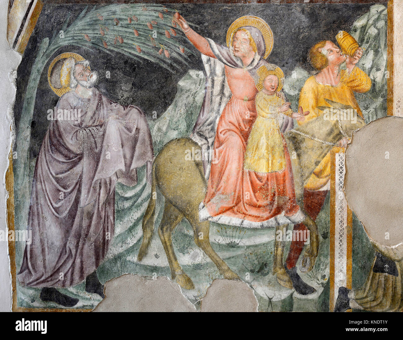 Italia S.Daniele del Friuli chiesa di Sant'Antonio Abate. Ciclo di affreschi del XV secolo da Pellegrino da San Daniele. Parete sinistra della navata centrale: la Fuga in Egitto (affresco della seconda metà del '300, opera di ignoto). Foto Stock