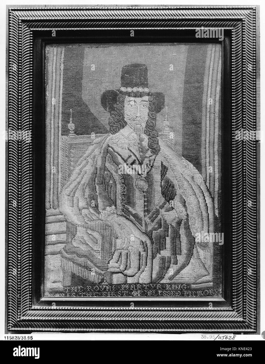 Questa immagine ricamata mostra un intreccio intricato e una cura artigianale dettagliata, raffigurando scene o motivi tipici del suo periodo e mettendo in risalto l'uso sapiente del filo e le tecniche di progettazione tessile. Foto Stock Questa immagine ricamata mostra un intreccio intricato e una cura artigianale dettagliata, raffigurando scene o motivi tipici del suo periodo e mettendo in risalto l'uso sapiente del filo e le tecniche di progettazione tessile. Foto Stock