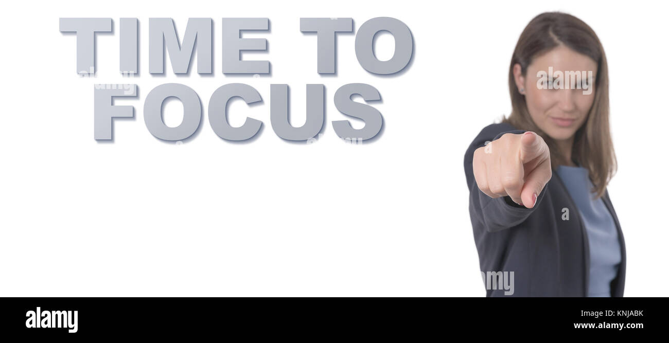 Business donna puntando il testo VOLTA PER METTERE A FUOCO IL CONCETTO Il concetto di business. Foto Stock