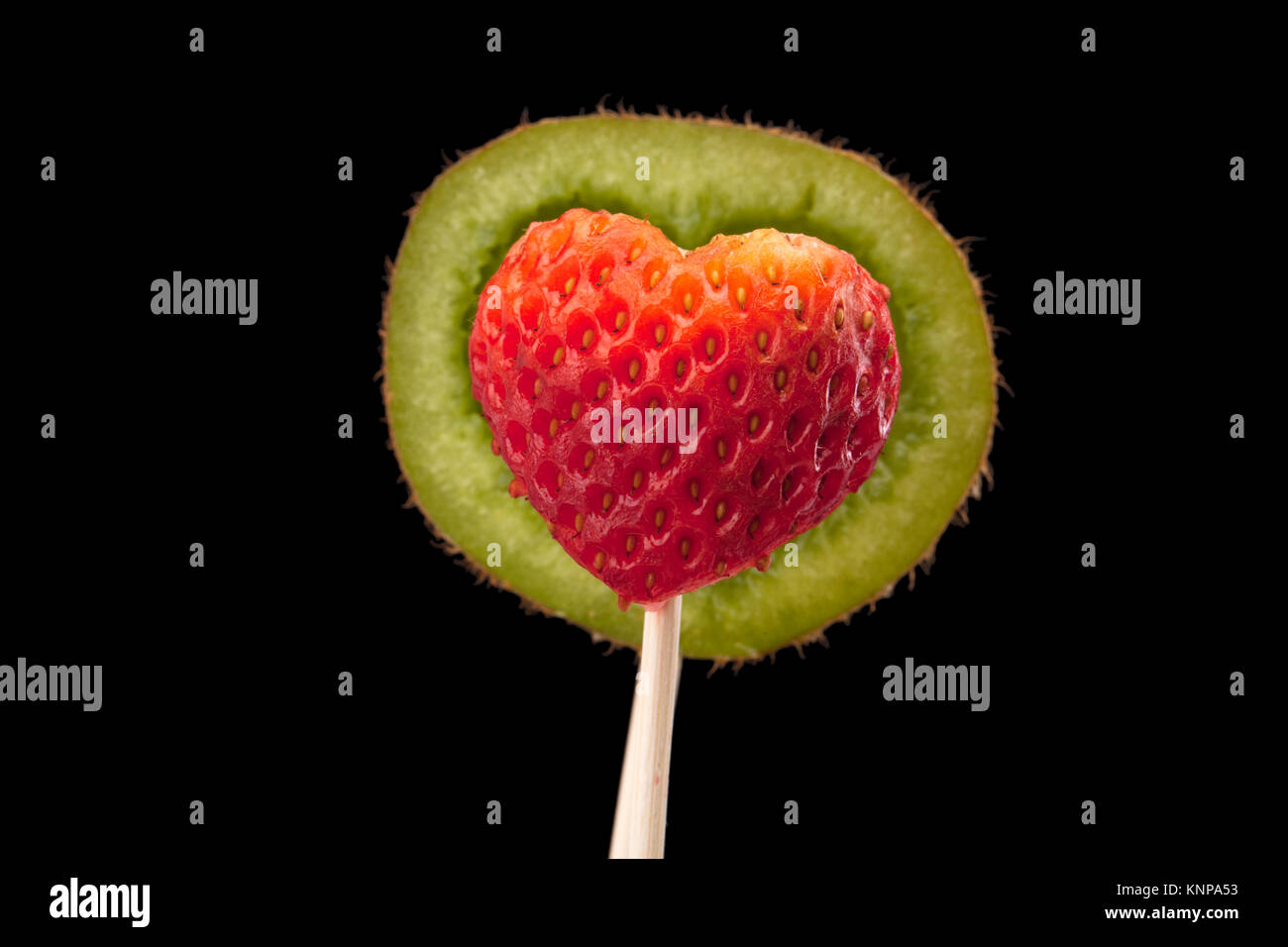 Progettato ripiano di kiwi e fragola su stick Foto Stock