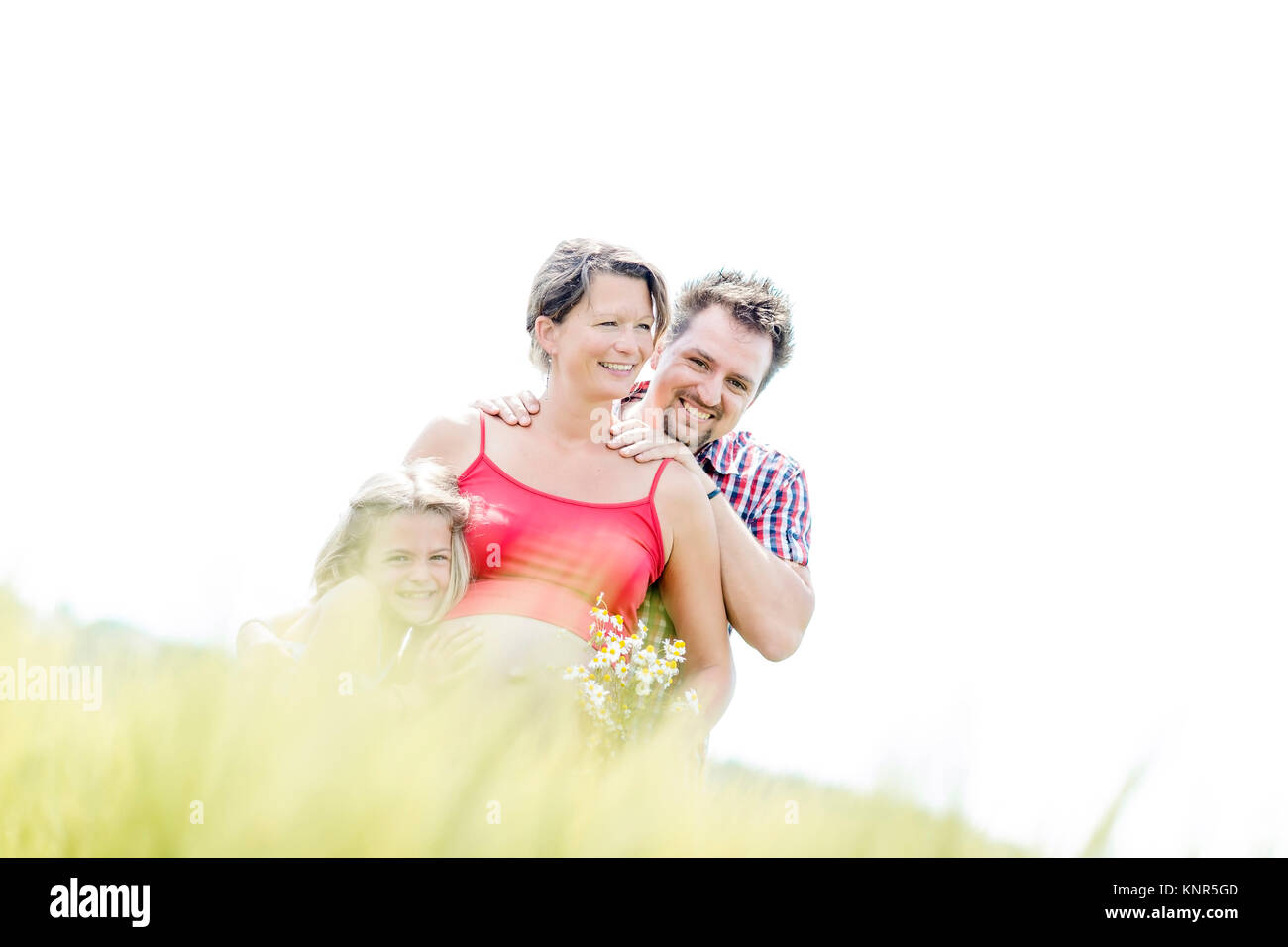 Schwangere Frau mit Mann und Tochter - donna incinta con la famiglia Foto Stock