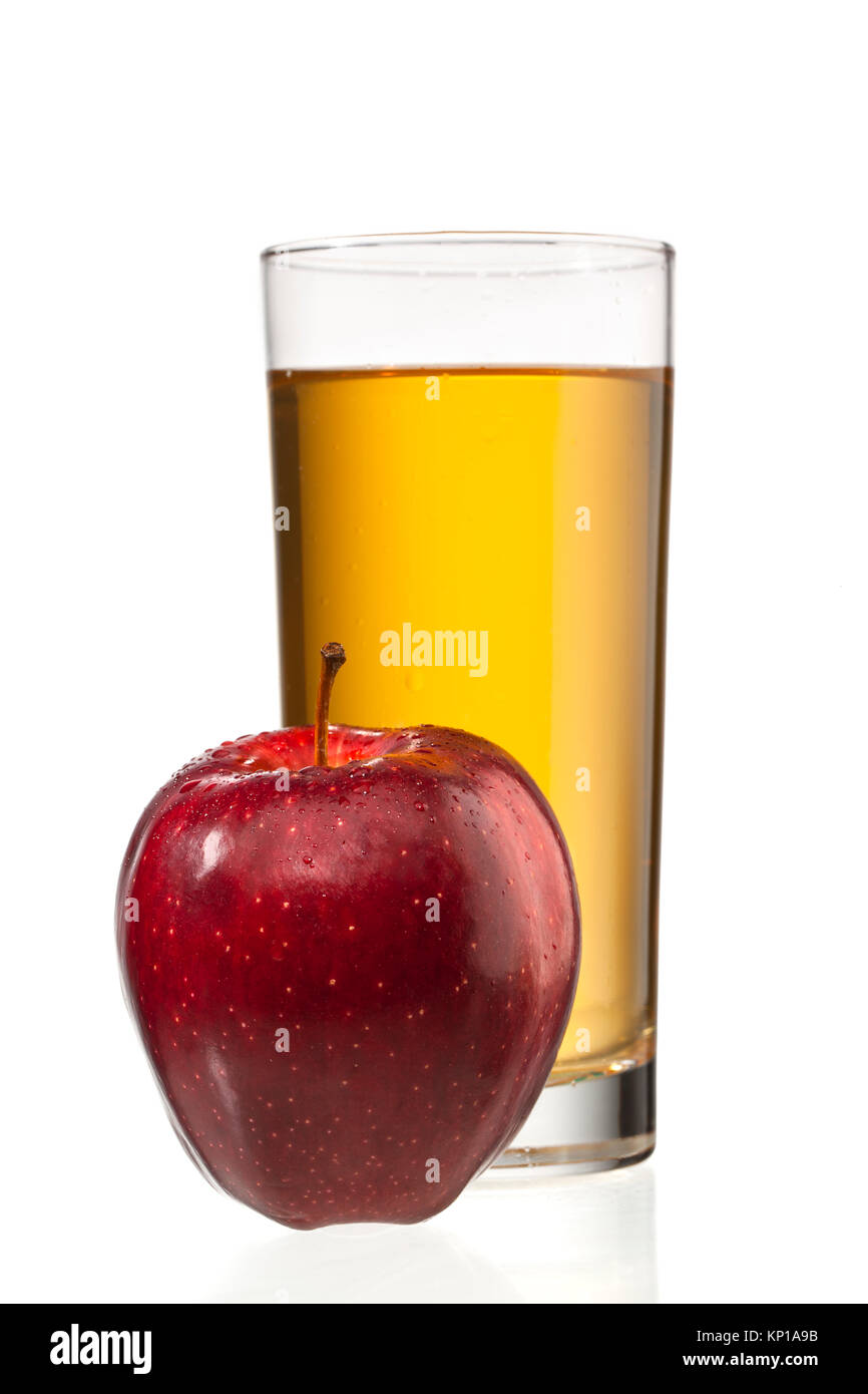 Apple accanto al succo di mela vetro Foto Stock