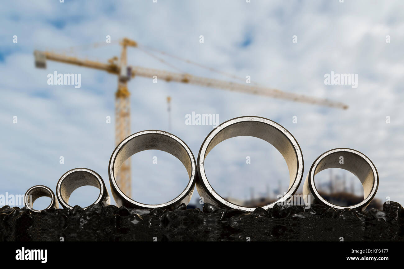 Tubi in ferro, backplane gru edili Foto Stock
