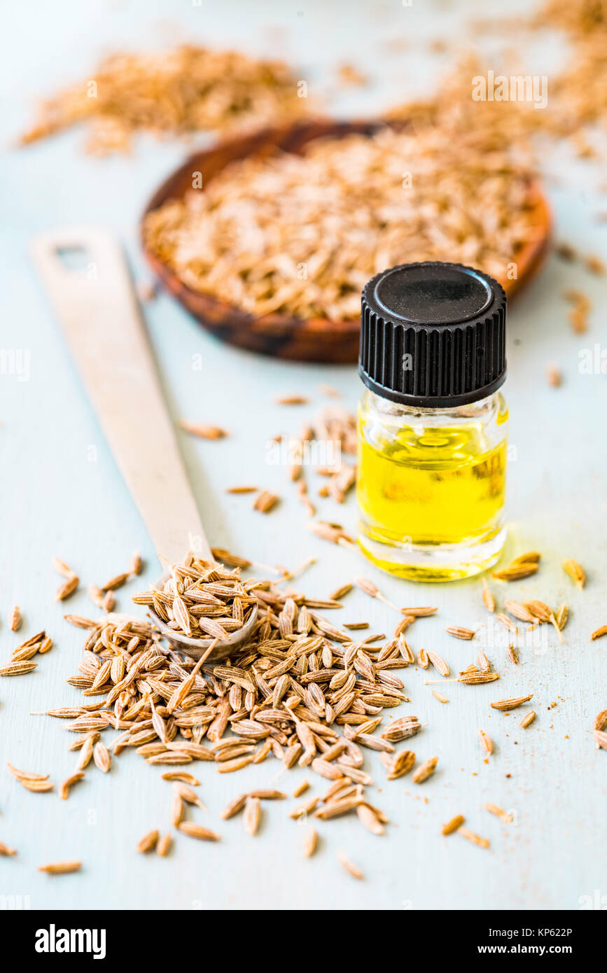 Olio essenziale di cumino. Foto Stock