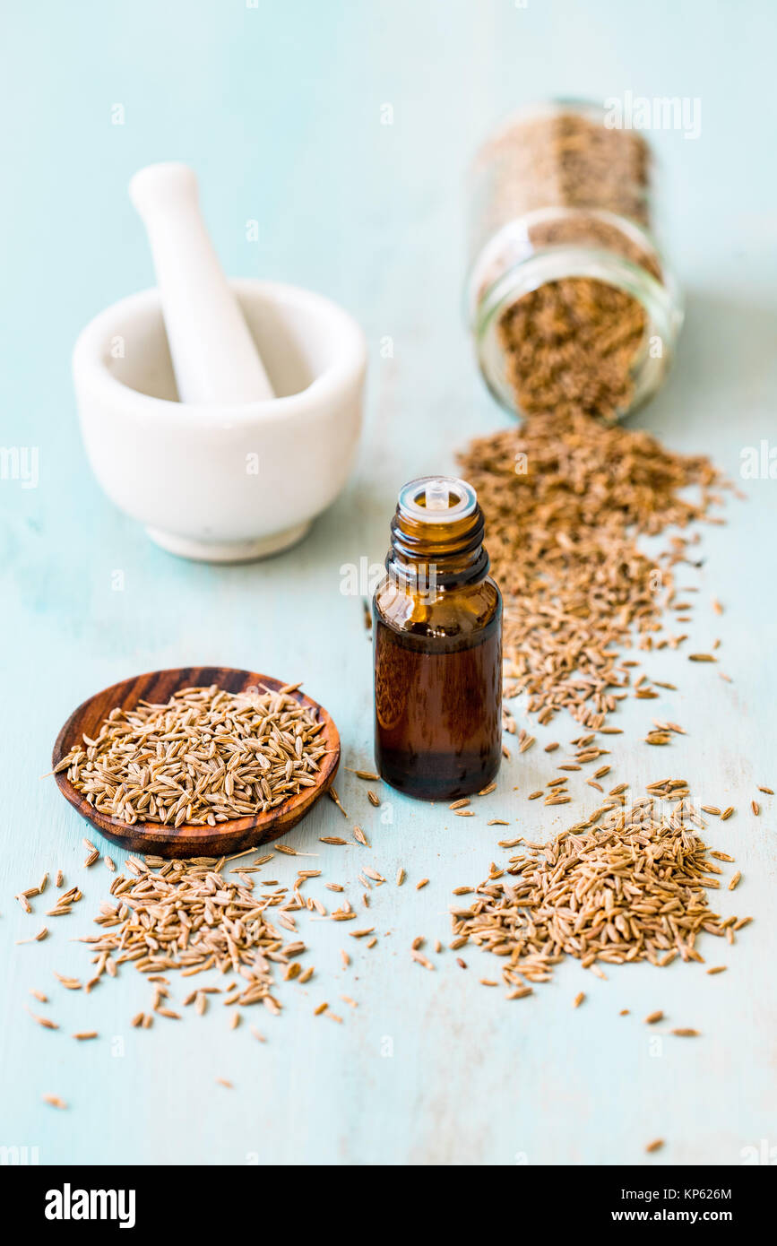 Olio essenziale di cumino. Foto Stock