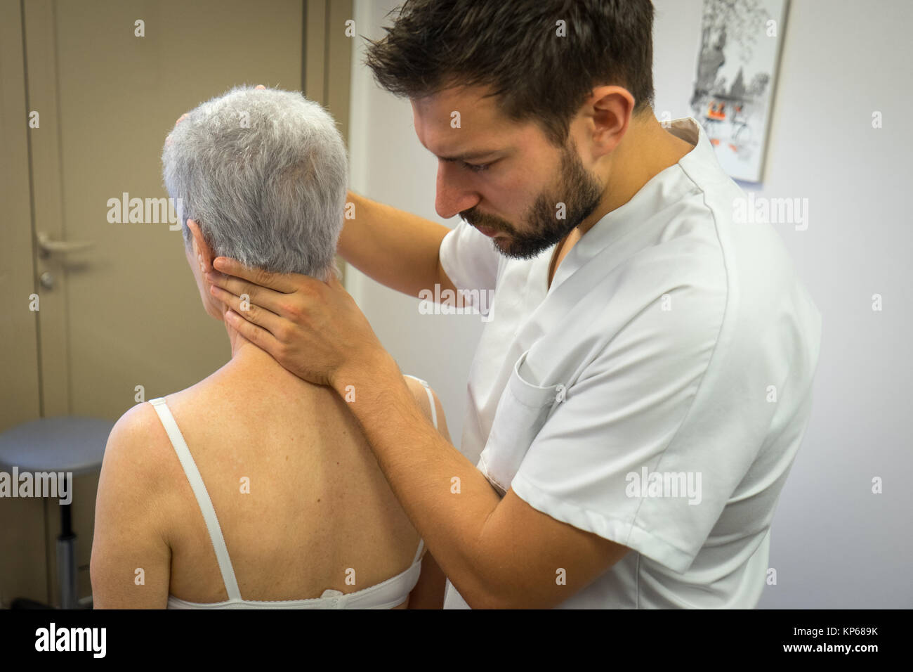 Osteopatia senior Foto Stock