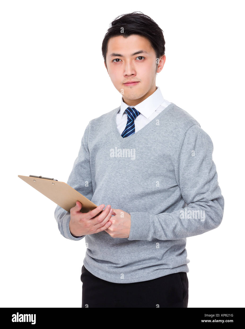 Asian giovane imprenditore di attesa con appunti Foto Stock