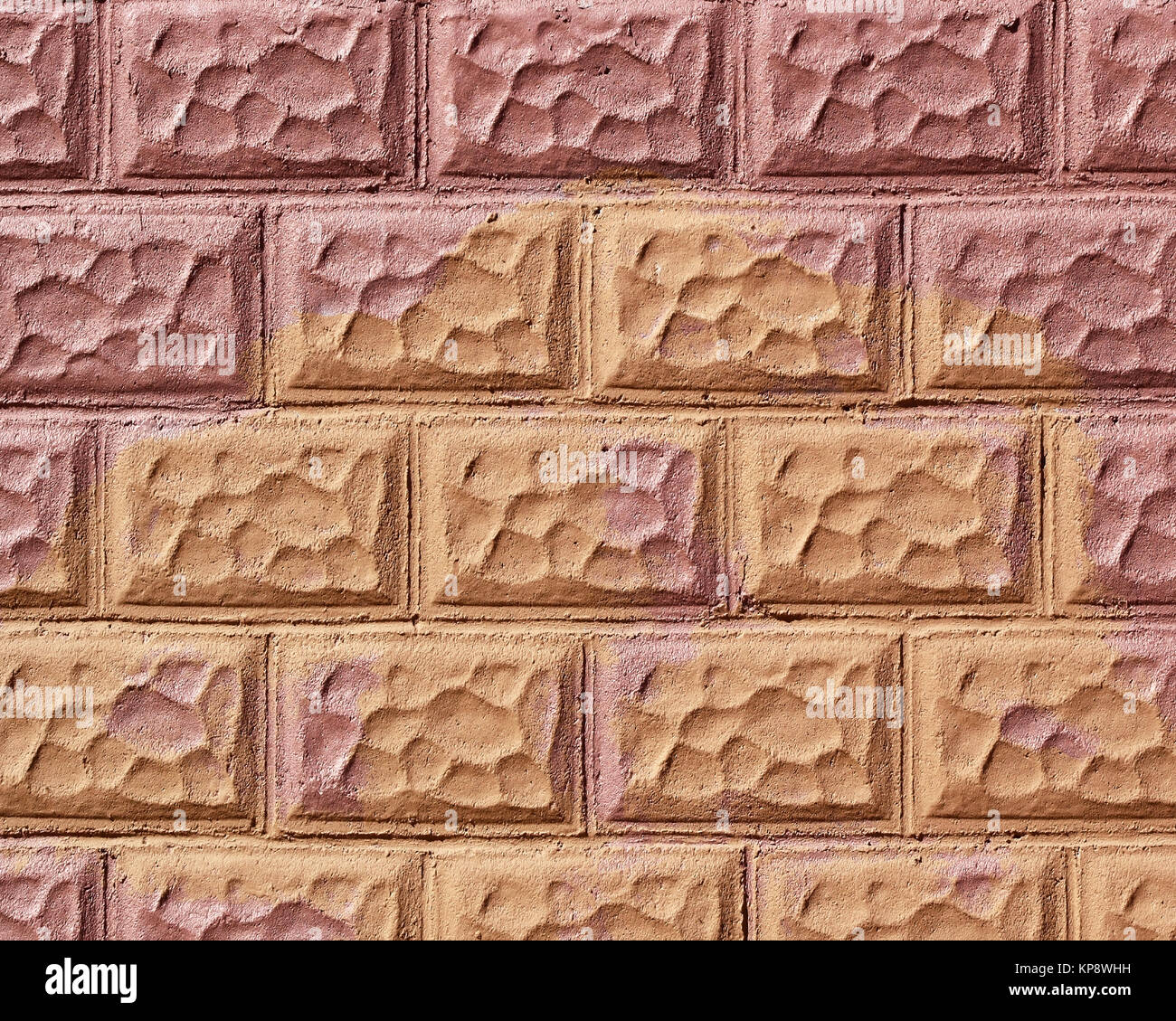Motivo decorativo muro di mattoni che è stato verniciato in due colori diversi Foto Stock