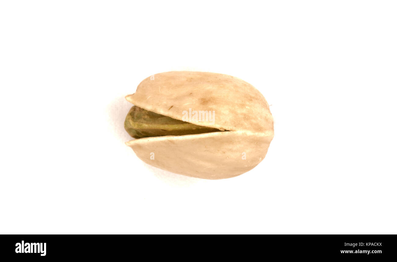 Vista macro del singolo pistacchio kernel e breve Foto Stock